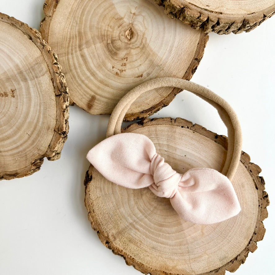 blush | knotted bow