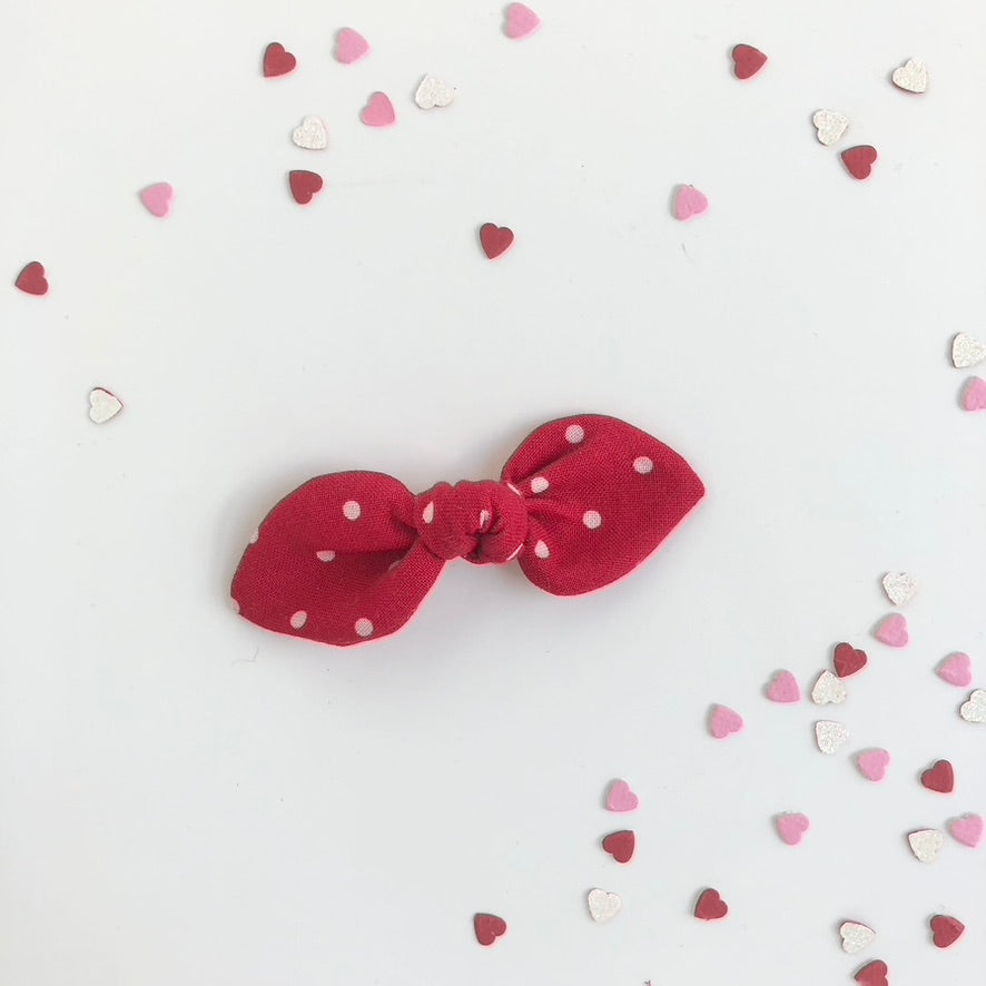 red polka dot | knotted bow hair tie