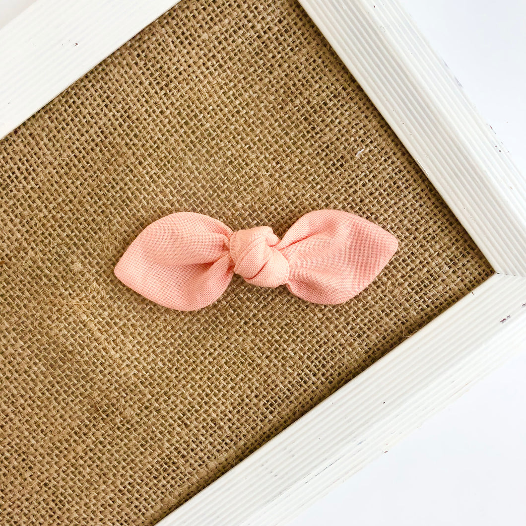 peach | knotted bow